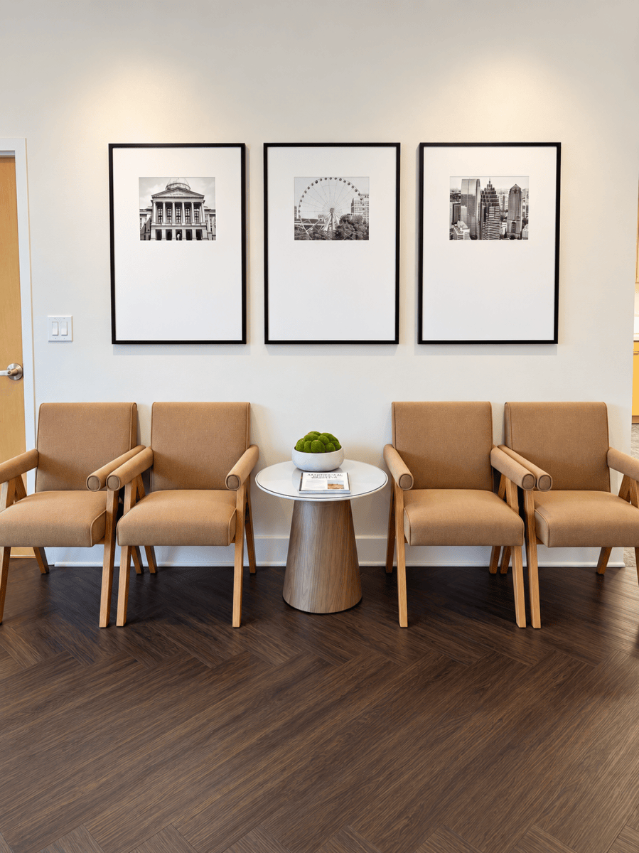 Calm waiting area with chairs and framed art